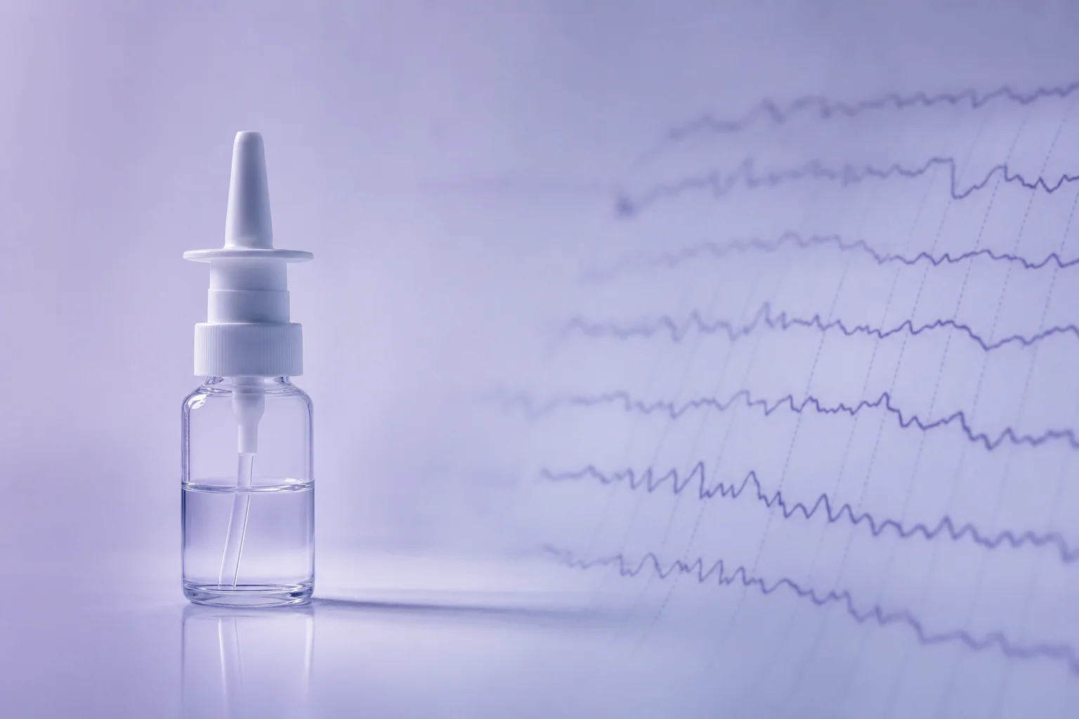 A glass nasal spray bottle beside a blurred EEG wave pattern on a near-white surface with lavender light